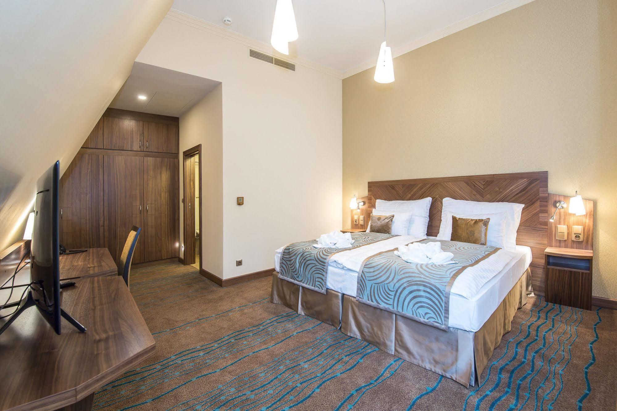 Merchants Crown Suites And Spa Praga Zewnętrze zdjęcie A room at the hotel